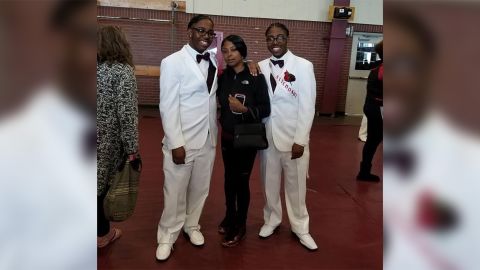 Deontre, left, and Deontae, with their mother, Victoria Lampkin.