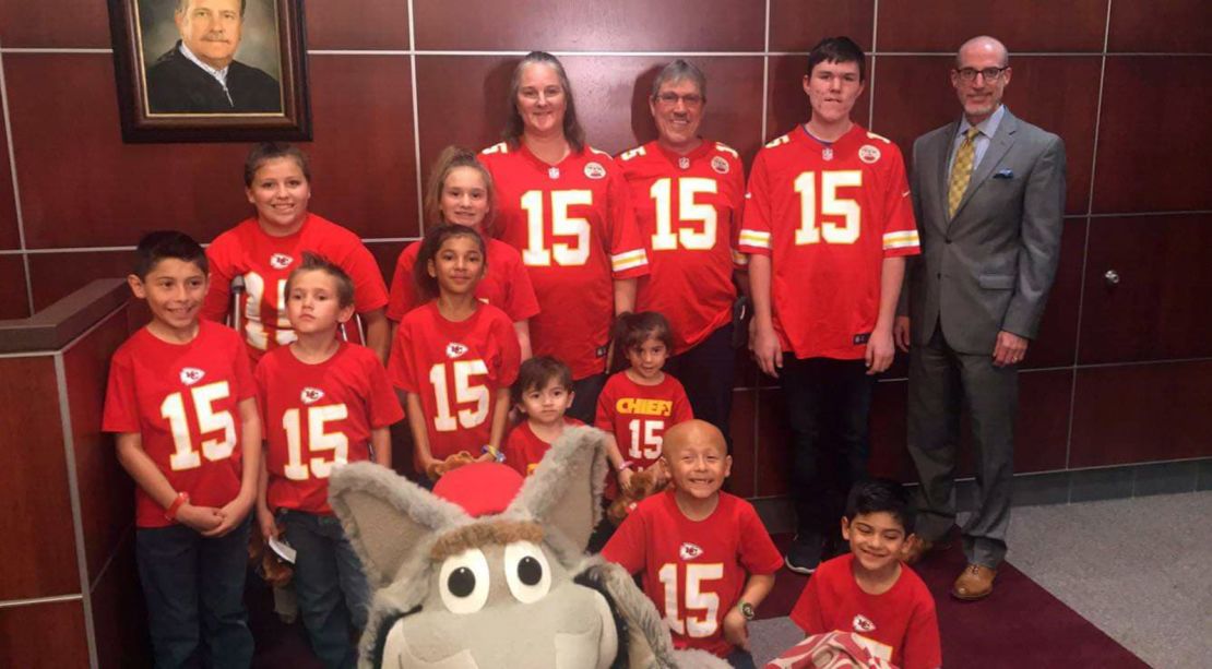 The Fulbrights donned their Kansas City Chiefs gear to celebrate the adoption becoming official.