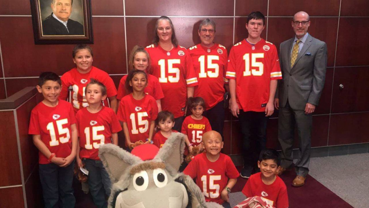 The Fulbrights donned their Kansas City Chiefs gear to celebrate the adoption becoming official.