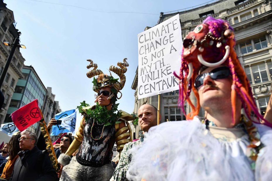 Demonstrators wear costumes at Oxford Circus.