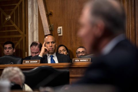 Booker looks on as Scott Pruitt, Oklahoma's attorney general and Donald Trump's pick to run the Environmental Protection Agency, testifies at his confirmation hearing in January 2017.