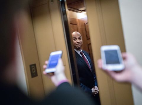 Booker boards an elevator at the Capitol in January 2018.