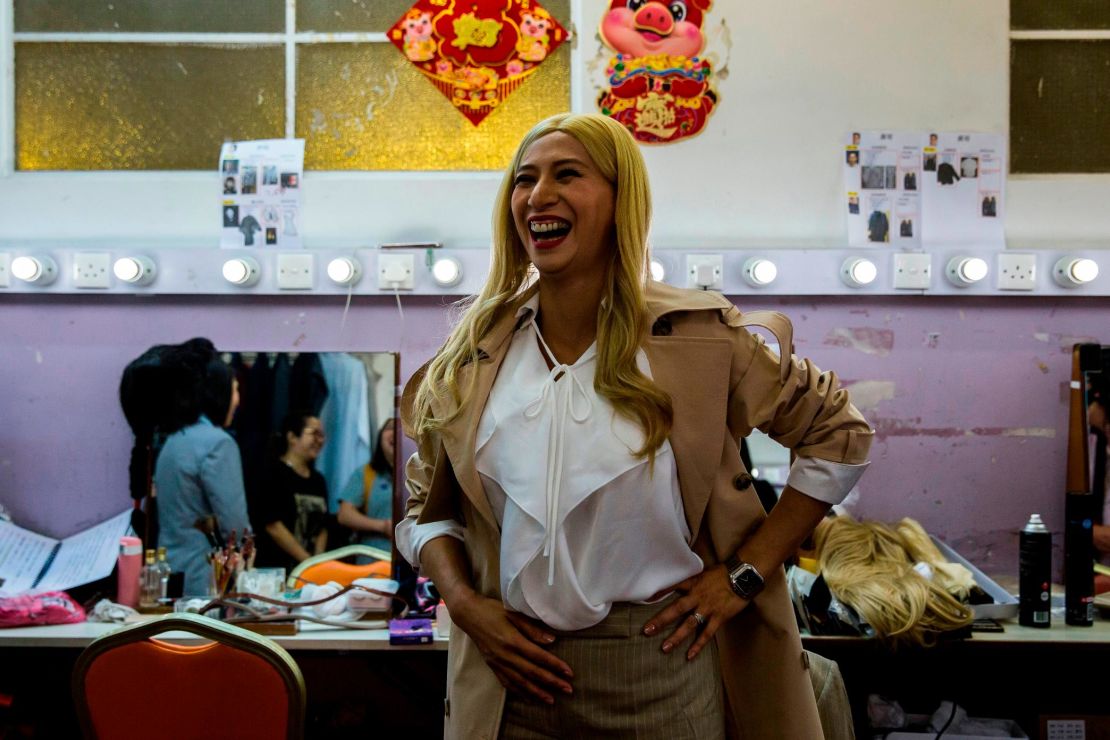 Actress Man Chan, pictured backstage, plays Ivanka Trump.