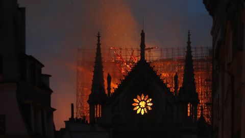 Flames and smoke rise from Notre Dame Cathedral as it burns in Paris.
