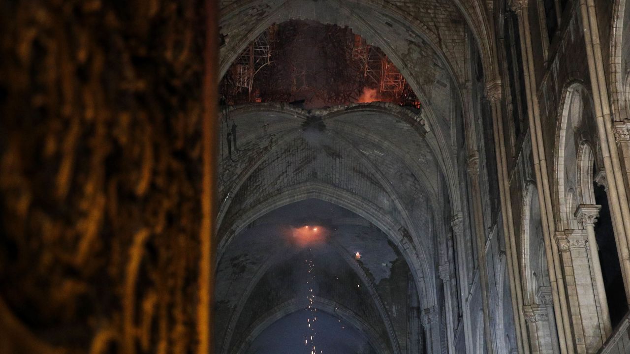 The smoldering roof of the cathedral overnight.