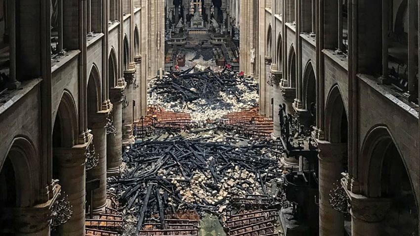 A picture taken on April 16, 2019 shows an interior view of the Notre-Dame Cathedral in Paris in the aftermath of a fire that devastated the cathedral. - The Paris fire service announced that the last remnants of the blaze were extinguished on April 16, 15 hours after the fire broke out. Thousands of Parisians and tourists watched in horror from nearby streets on April 15 as flames engulfed the building and rescuers tried to save as much as they could of the cathedral's treasures built up over centuries. (Photo by - / AFP)        (Photo credit should read -/AFP/Getty Images)