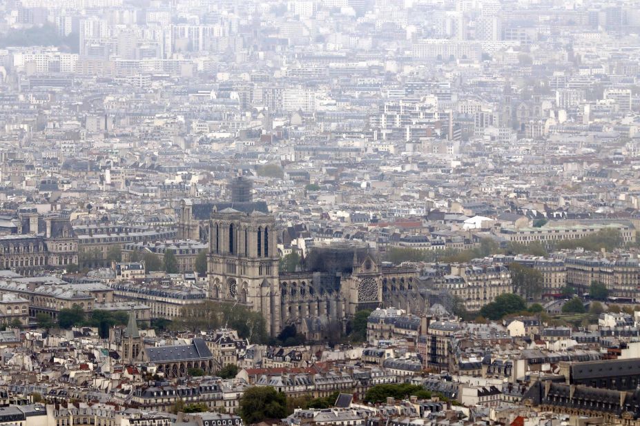 The burnt out cathedral is seen from the top of the Montparnasse tower the day after the fire.