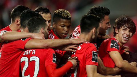 Joao Felix (R) celebrates with his Benfica teammates.