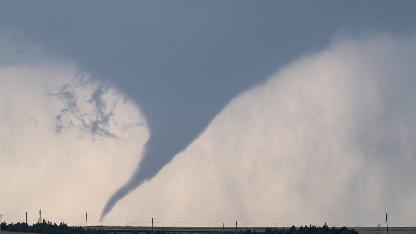 DODGE CITY, KS - MAY 24: A tornado is seen south of Dodge City, Kansas moving north on May 24, 2016 in Dodge City, Kansas. About 30 tornadoes were reported on Tuesday in five different states from Michigan to Texas. Damage to homes and property was also reported in Ford County, Kansas. (Photo by Brian Davidson/Getty Images)