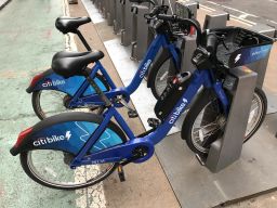 The electric Citi Bike, bottom, has a similar design to the traditional Citi Bike, above, which isn't electric and relies entirely on riders pedaling.