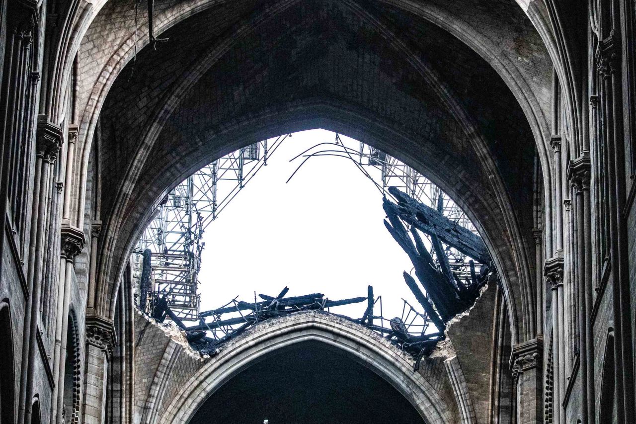 Daylight shines through the fallen roof of Notre Dame on April 16, 2019.