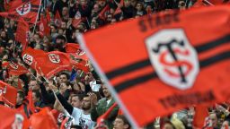 Stade Toulousain's supporters wave flags during the French Top 14 rugby union match Toulouse against Clermont on April 14, 2019 at the Municipale Stadium in Toulouse, southern France. (Photo by PASCAL PAVANI / AFP)        (Photo credit should read PASCAL PAVANI/AFP/Getty Images)