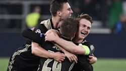 (From L) Ajax's Dutch defender Joel Veltman, Ajax's Danish midfielder Lasse Schone and Ajax's Dutch defender Matthijs de Ligt celebrate defeating Juventus at the end of the UEFA Champions League quarter-final second leg football match Juventus vs Ajax Amsterdam on April 16, 2019 at the Juventus stadium in Turin. (Photo by Marco Bertorello / AFP)        (Photo credit should read MARCO BERTORELLO/AFP/Getty Images)