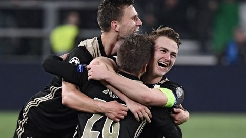 Joel Veltman, Lasse Schone and Matthijs de Ligt celebrate victory over Juventus.