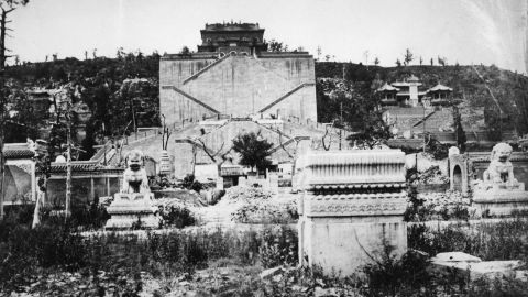 Imperial bronze lion sculptures in the ruins of the Old Summer Palace, Beijing, China, 1869. The Palace, formerly the residence of emperors of the Qing Dynasty, was destroyed by British and French forces during the Second Opium War in 1860.