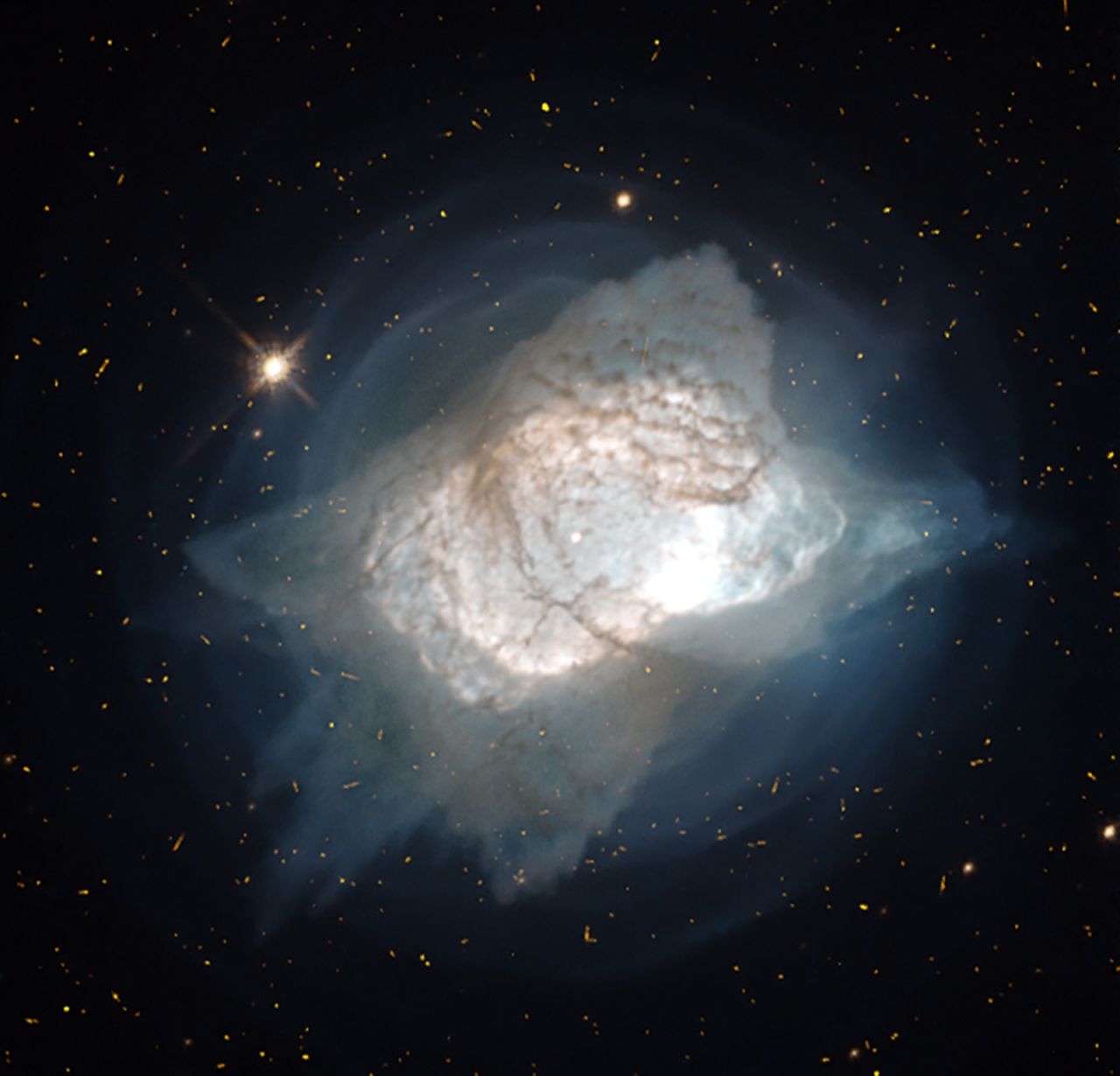 One of the brightest planetary nebulae on the sky and first discovered in 1878, nebula NGC 7027 can be seen toward the constellation of the Swan.