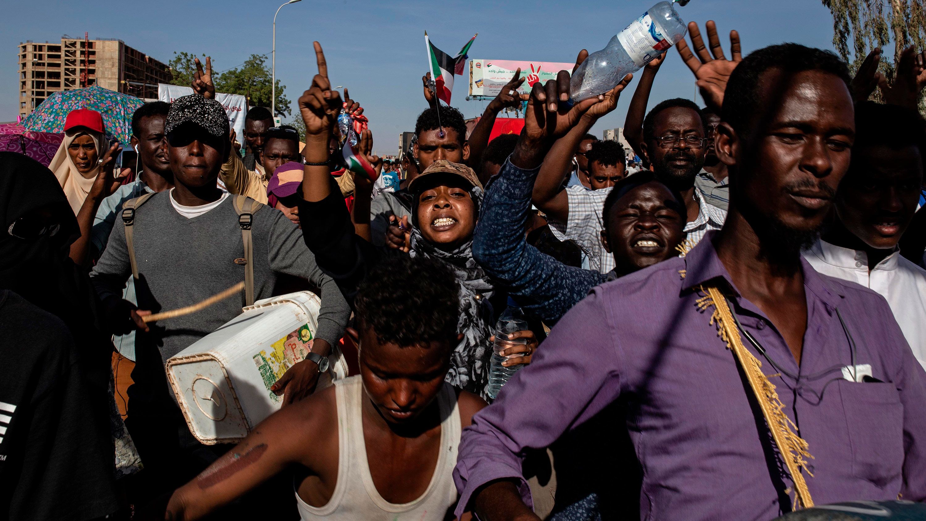 Demonstrators rally near the military headquarters in Khartoum on April 15.