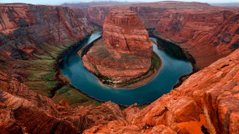 The Colorado River wraps around Horseshoe Bend in the in Glen Canyon National Recreation Area in Page, Arizona, on February 11, 2017. / AFP PHOTO / RHONA WISE        (Photo credit should read RHONA WISE/AFP/Getty Images)