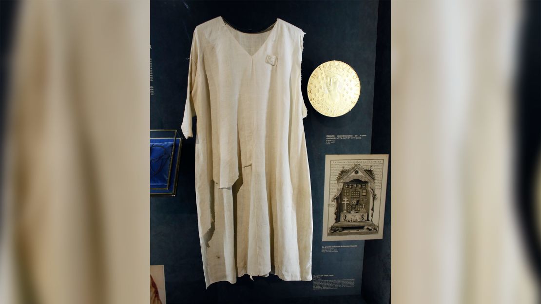 A view of the tunic allegedly worn by Saint Louis on display inside the Notre Dame cathedral in Paris on November 29, 2012.