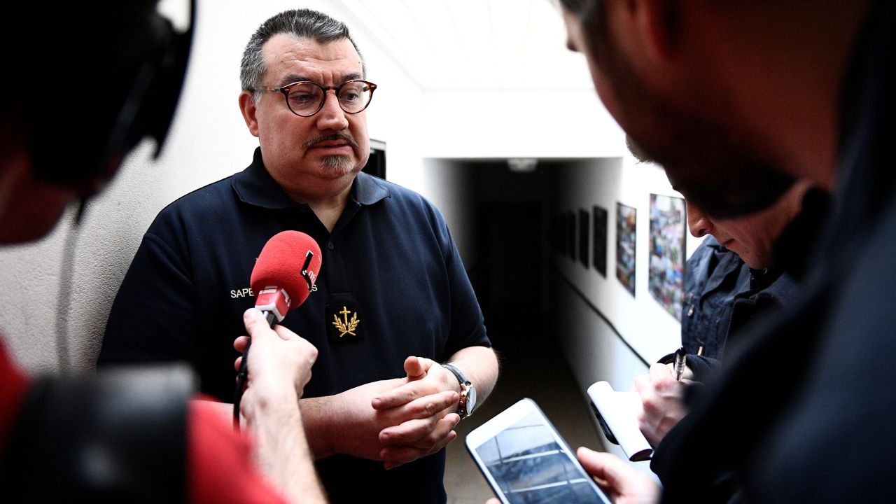 Chaplain of the Paris fire brigade, Jean-Marc Fournier, answers journalists' questions on April 17, 2019, at the Poissy fire station in the Cardinal Lemoine street near the cathedral in Paris.