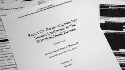 Special counsel Robert Mueller's redacted report on Russian interference in the 2016 presidential election as released on Thursday, April 18, 2019, is photographed in Washington. (AP Photo/Jon Elswick)