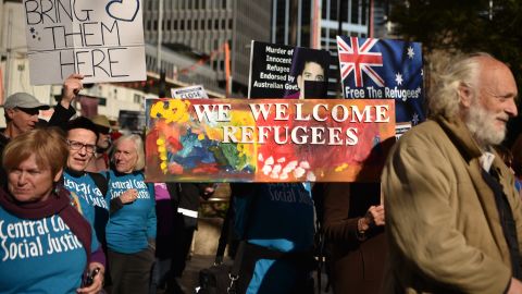 Demonstrators march during a protest to demand humane treatment of asylum seekers and refugees, in Sydney, Australia, on July 21, 2018.