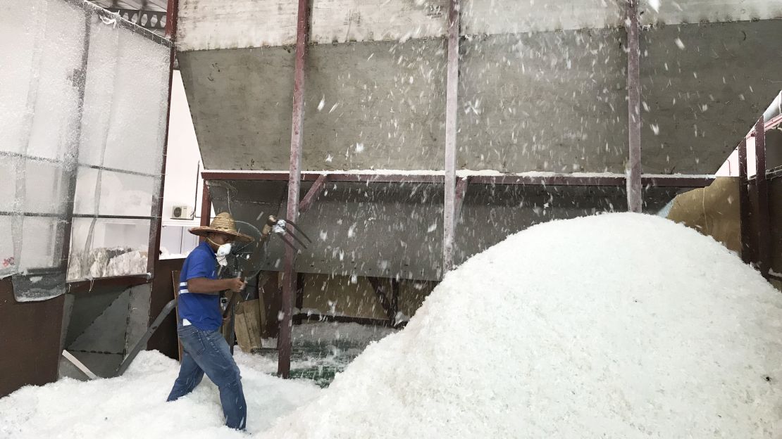 Plastic flakes are produced from recycled material. These flakes will be turned into pellets.