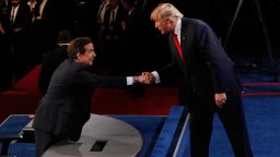Donald Trump shakes hands with Fox News anchor and moderator Chris Wallace