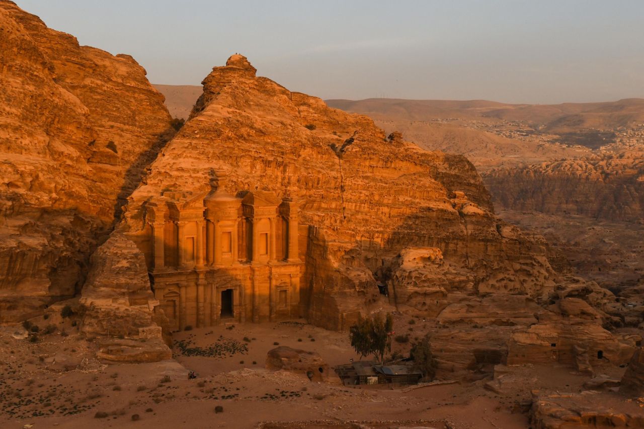 <strong>Petra, Jordan: </strong>Explore the perfectly preserved ancient Nabatean city of Petra on camel back or strap on your walking boots and hike around its walkways. This is a sunset view of Ad Deir (The Monastery).