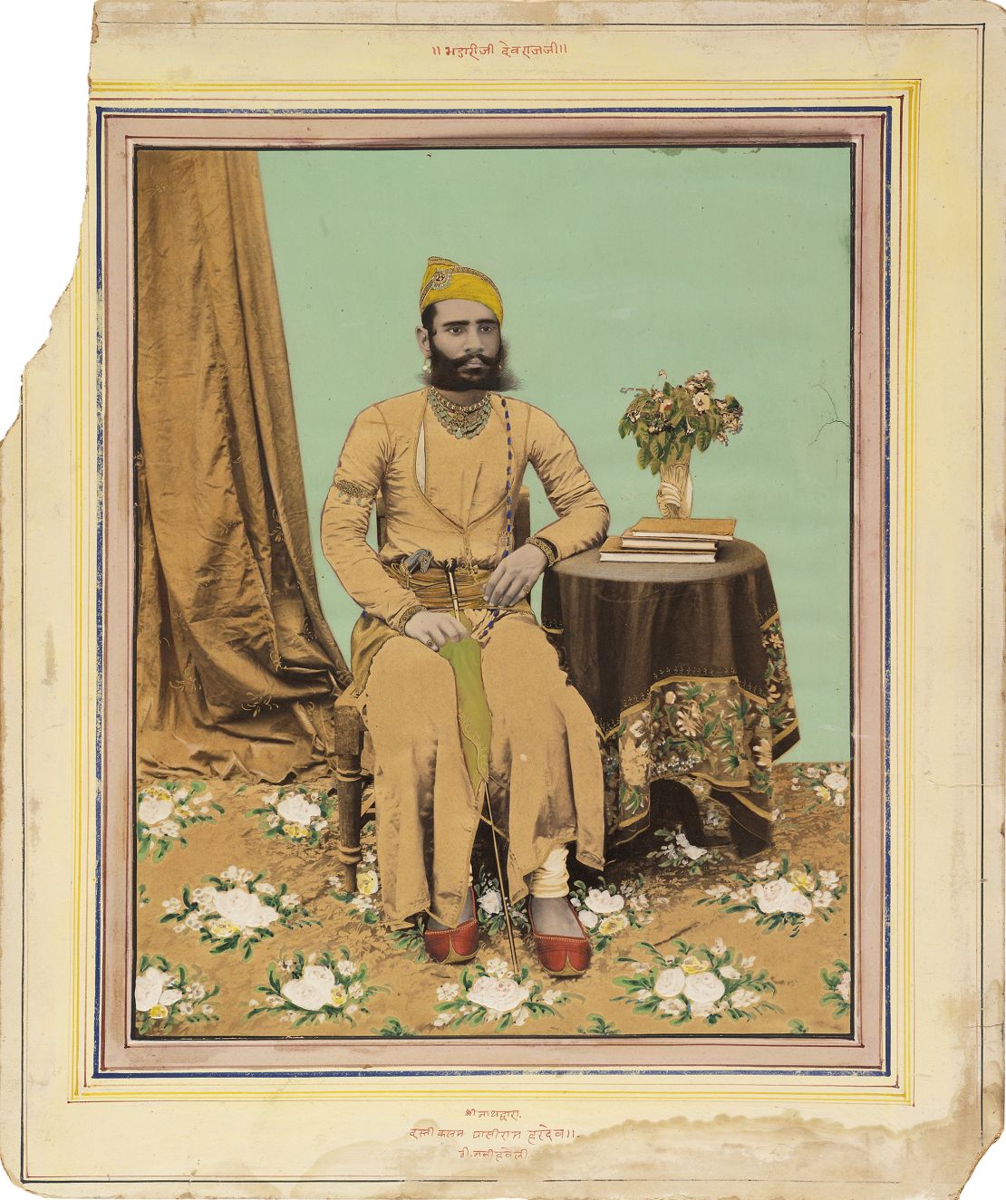 A portrait from the 1890s demonstrating a tendency in India to paint heavily over photographs.