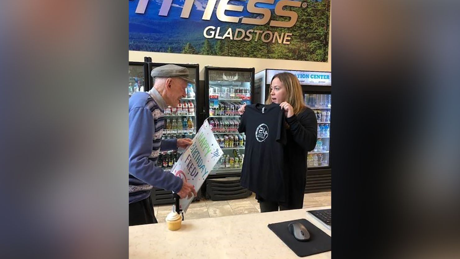 Fred Lawrence was presented with a new 24 Hour Fitness T-shirt, a cupcake and  card signed by the staff and every member of the gym on Wednesday when he came to work out on his 98th birthday.