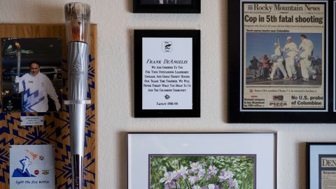 Framed memorabilia are displayed on Frank DeAngelis' office walls at his home.