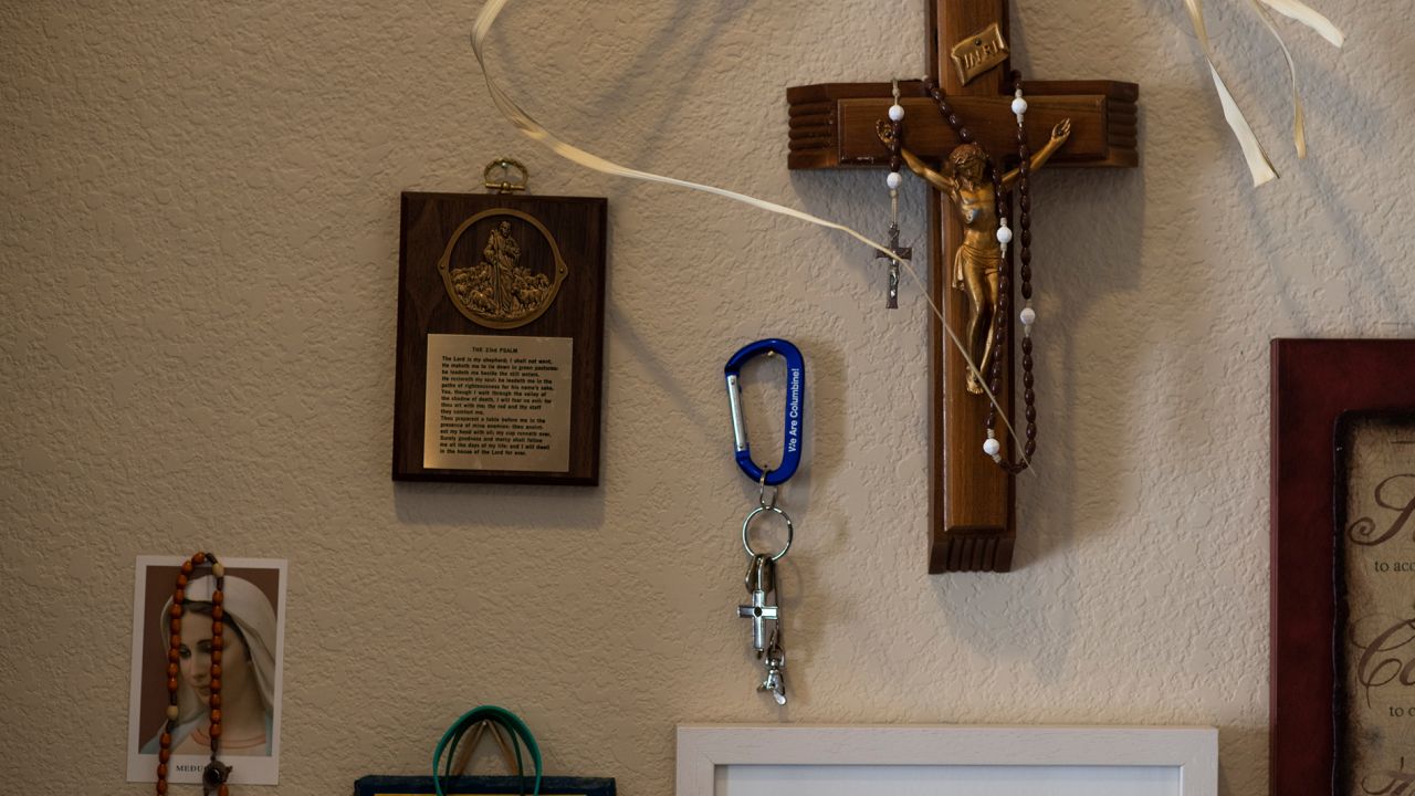 Religious icons are displayed in Frank DeAngelis' home office.