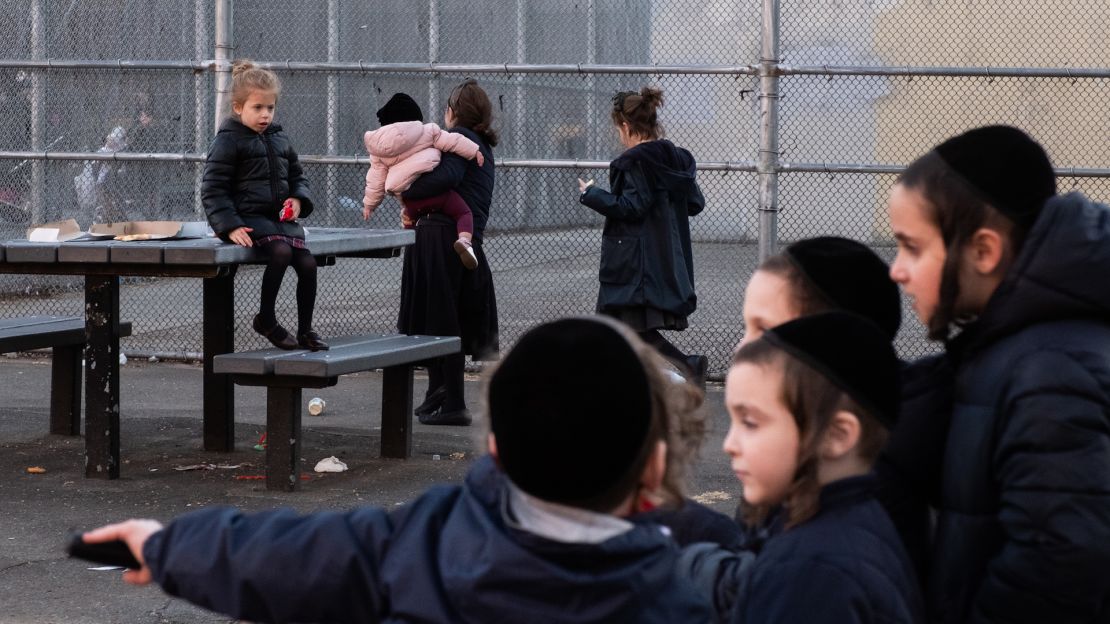 Children at a playground in Williamsburg, which has seen 294 confirmed cases of measles.