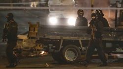 Police guard a crime scene during unrest in the Creggan area of Londonderry, in Northern Ireland, Thursday, April 18, 2019. (Niall Carson/PA via AP)