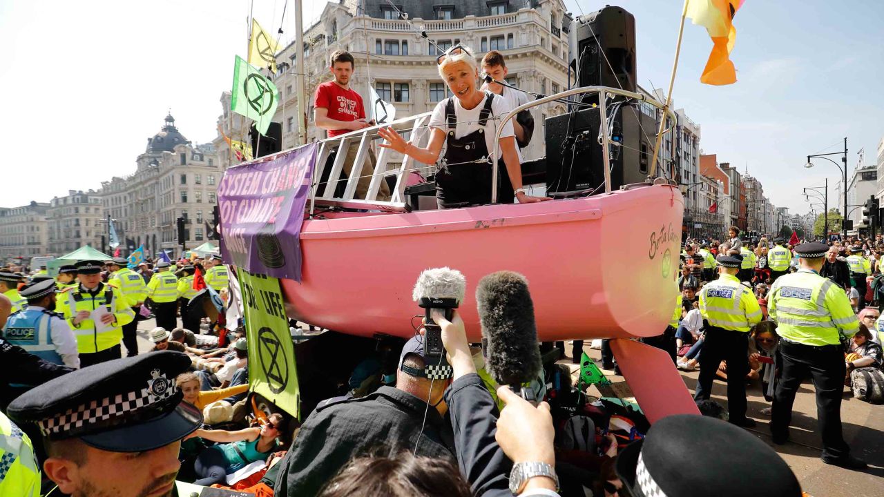 British actress Emma Thompson talks to the media from atop the pink climate change boat Friday. 