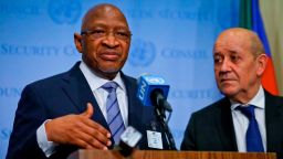 Prime Minister of Mali Soumeylou Boubèye Maïga, left, and France Foreign Minister Jean-Yves Le Drian, right, hold a press briefing meeting in the United Nations Security Council at U.N. headquarters, Friday March 29, 2019. (AP Photo/Bebeto Matthews)