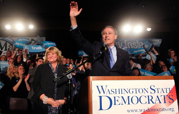 Inslee is joined by his wife, Trudi, during an election-night party in 2012. He defeated Republican Rob McKenna with 51.54% of the vote.