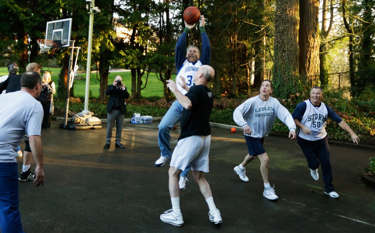 Inslee plays basketball at the governor's mansion on the day he was sworn in.