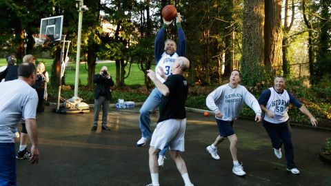 Inslee plays basketball at the governor's mansion on the day he was sworn in.