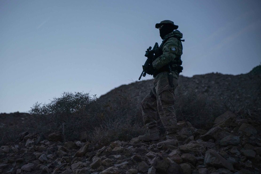 A member of United Constitutional Patriots is pictured patrolling near Mt. Christo Rey in Sunland Park, New Mexico, on March 20, 2019.