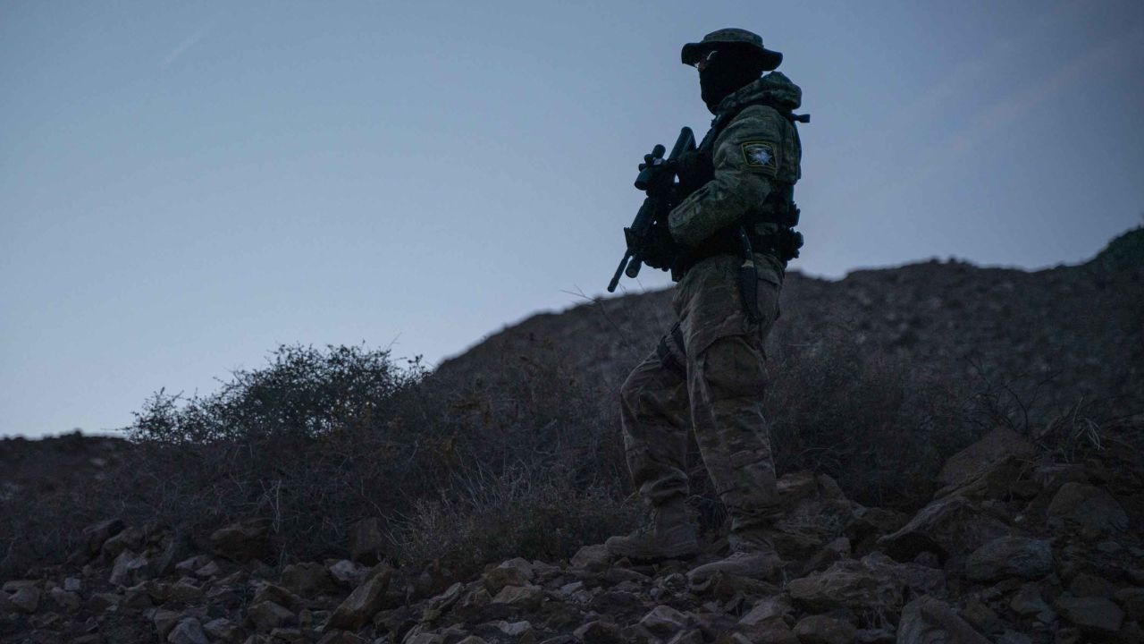 A member of United Constitutional Patriots is pictured patrolling near Mt. Christo Rey in Sunland Park, New Mexico, on March 20, 2019.