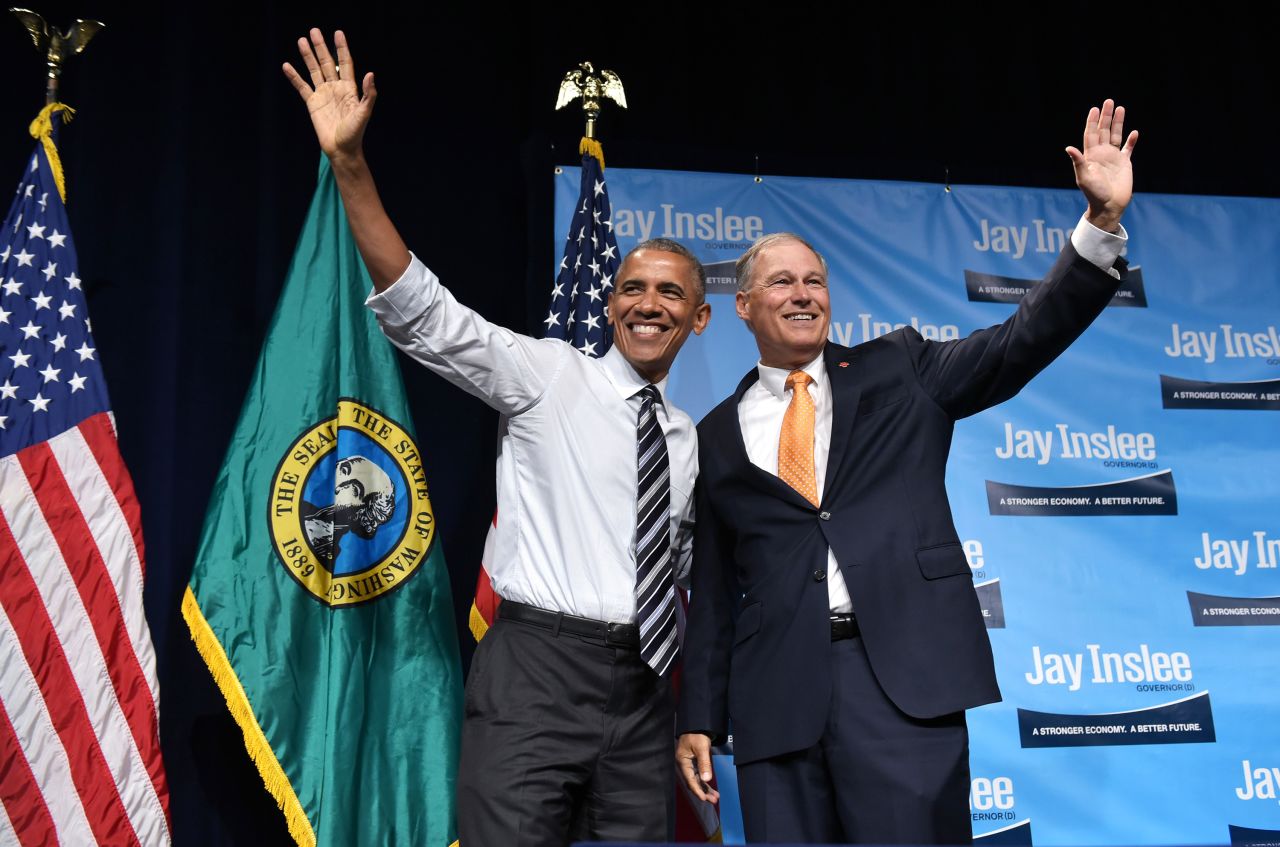 Inslee is joined by President Barack Obama at a fundraiser in Seattle in June 2016.