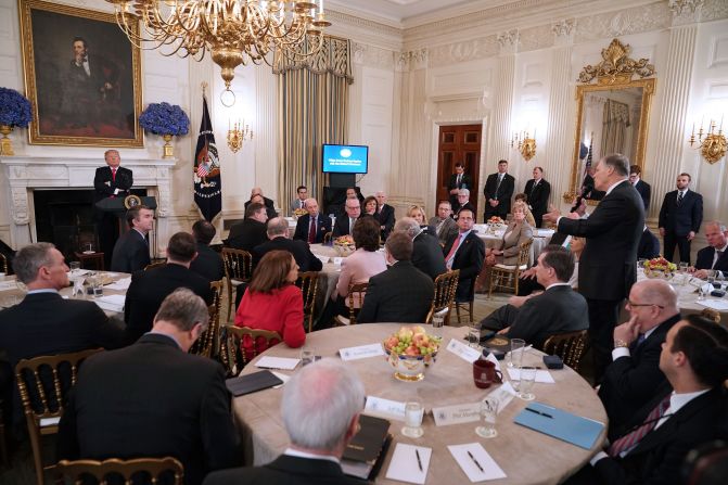 US President Donald Trump looks at Inslee as the White House hosted a listening session with many of the nation's governors in February 2018. Inslee told Trump that <a href="https://www.cnn.com/2018/02/26/politics/jay-inslee-donald-trump-tweeting/index.html" target="_blank">"we need a little less tweeting here and a little more listening"</a> on the subject of arming teachers to deter school shootings. Inslee pleaded with Trump to scrap his proposal of arming teachers. 