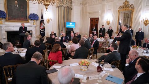 US President Donald Trump looks at Inslee as the White House hosted a listening session with many of the nation's governors in February 2018. Inslee told Trump that <a href="https://www.cnn.com/2018/02/26/politics/jay-inslee-donald-trump-tweeting/index.html" target="_blank">"we need a little less tweeting here and a little more listening"</a> on the subject of arming teachers to deter school shootings. Inslee pleaded with Trump to scrap his proposal of arming teachers.