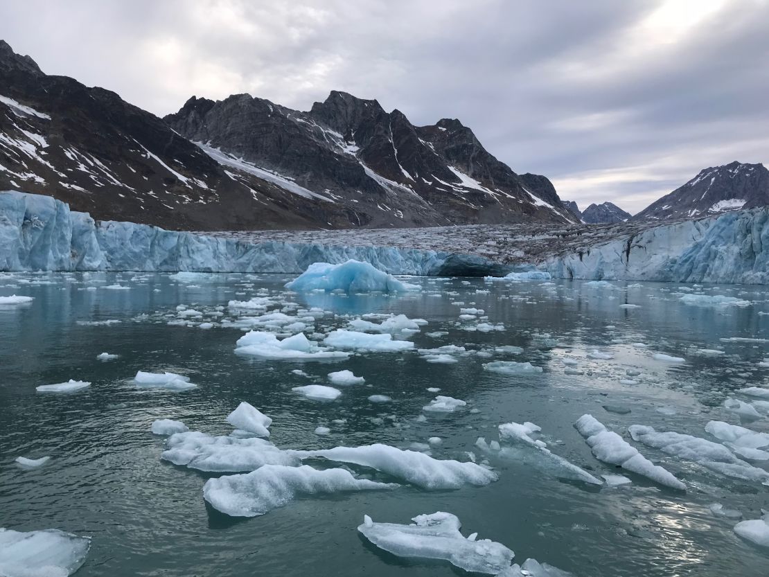 Tidewater glaciers slide through Greenland's valleys, breaking up into icebergs when they meet the ocean.