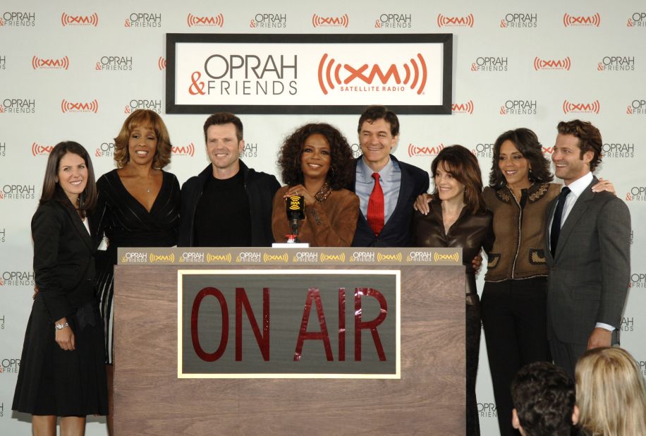 Williamson, third from right, joins media mogul Oprah Winfrey and other Winfrey friends for the launch of Winfrey's XM Radio station in 2006.