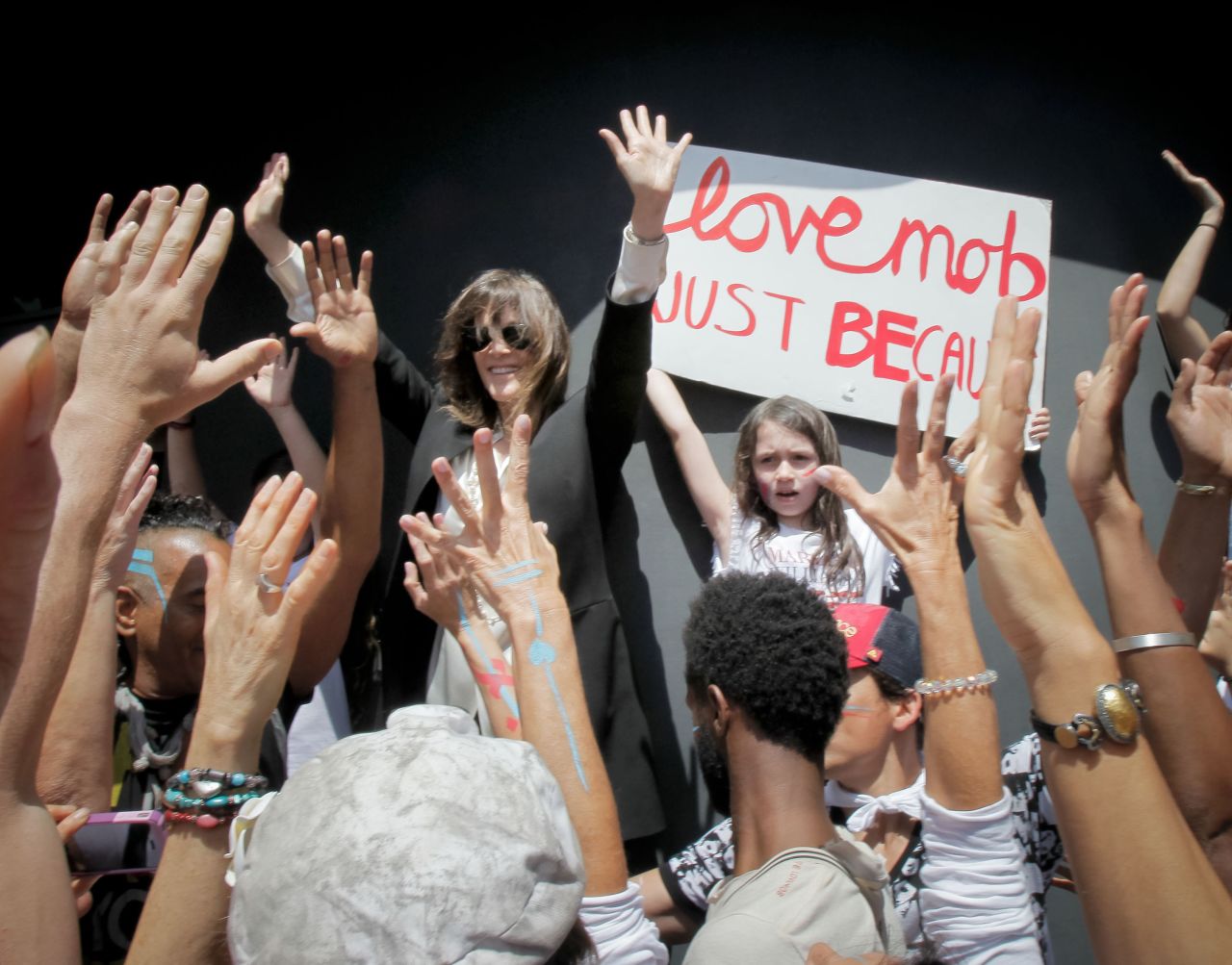 Williamson leads a "love mob" campaign rally in May 2014.
