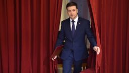 Ukrainian comic actor and the presidential candidate Volodymyr Zelensky enters a hall in Kiev on March 6, 2019, to take part in the shooting of the television series "Servant of the People" where he plays the role of the President of Ukraine. - Anger with the political elite is partly behind the rise of Volodymyr Zelensky, a TV actor with no political experience who is the frontrunner in the upcoming presidential vote.  Zelensky is polling at 25 percent, ahead of Poroshenko on 17 percent and former prime minister Yulia Tymoshenko on 16 percent as of March 4, 2019. (Photo by Sergei SUPINSKY / AFP)        (Photo credit should read SERGEI SUPINSKY/AFP/Getty Images)