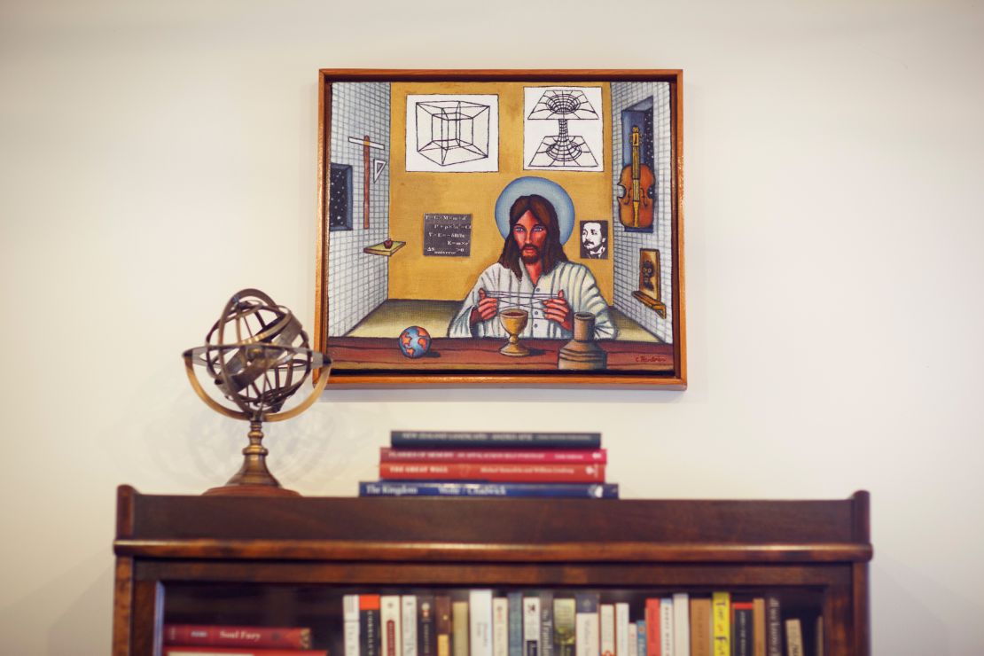 A painting called "String Theory" by artist Charles Barbier is seen in Brown's library.